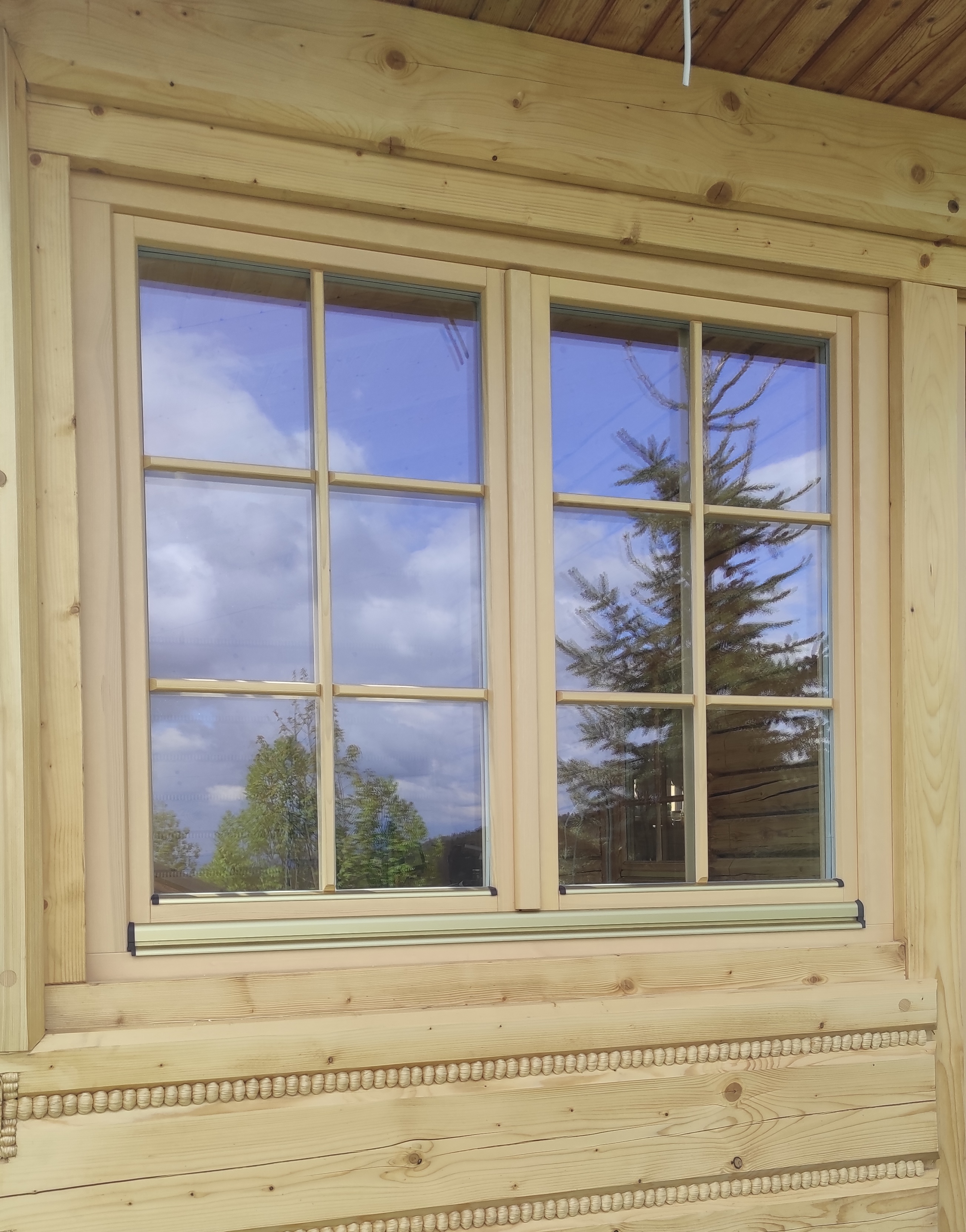 okna drewniane dom z bali Jordanów producent Knapstol